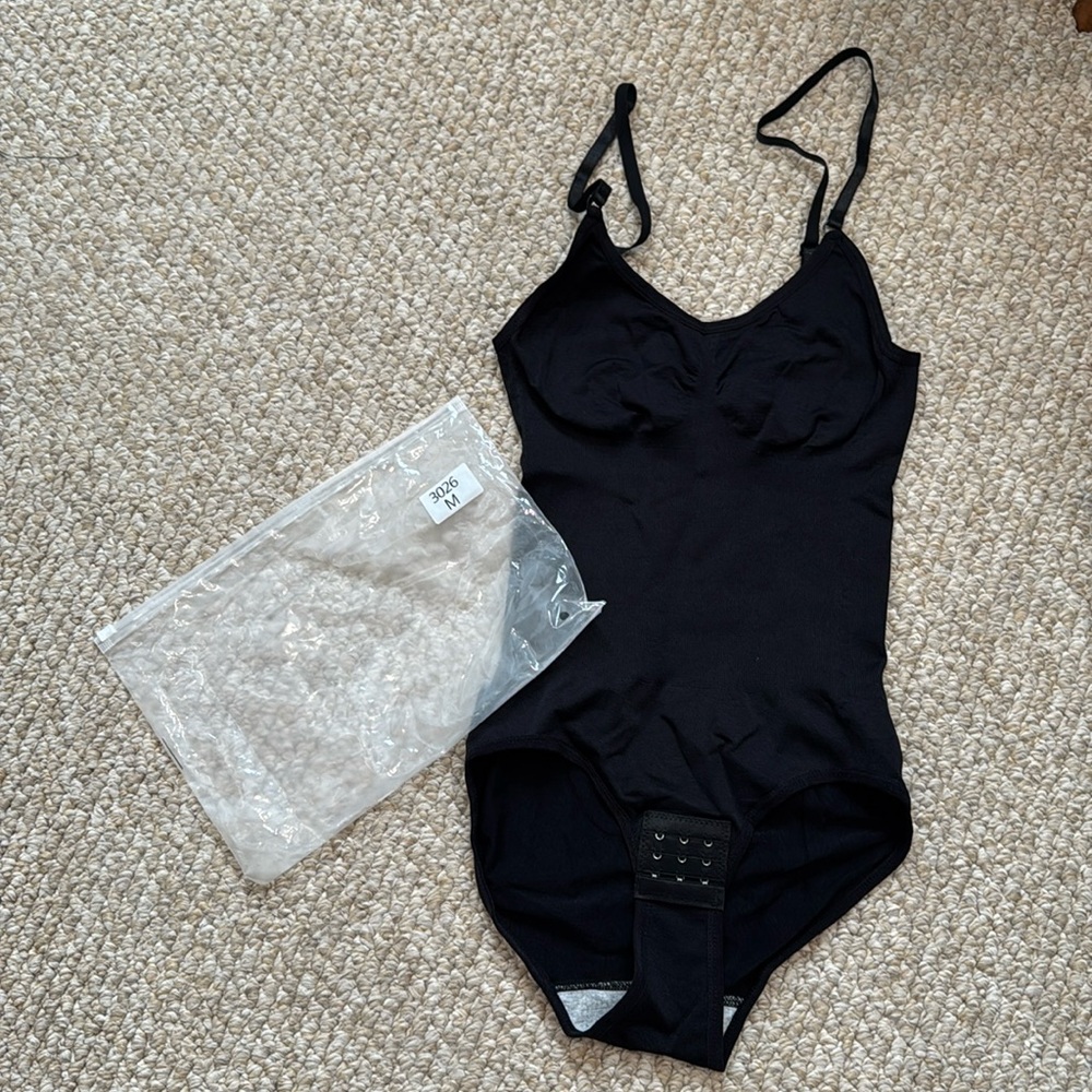 NWOT never worn black Shapeware bodysuit with adjustable straps